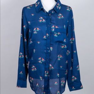 Blue button down bird print blouse.